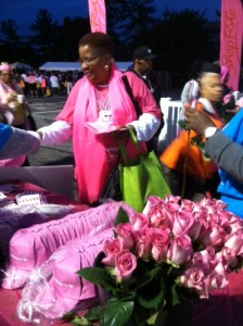 Survivors receiving hats, and pins for every year being a survivor